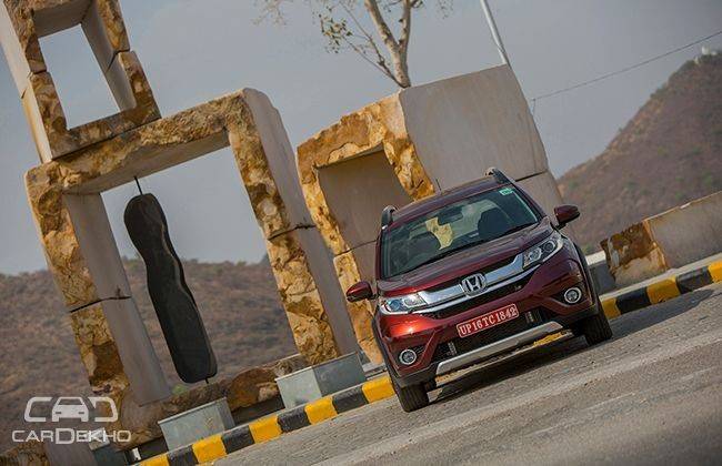 Triple century of dealerships for Honda cars India